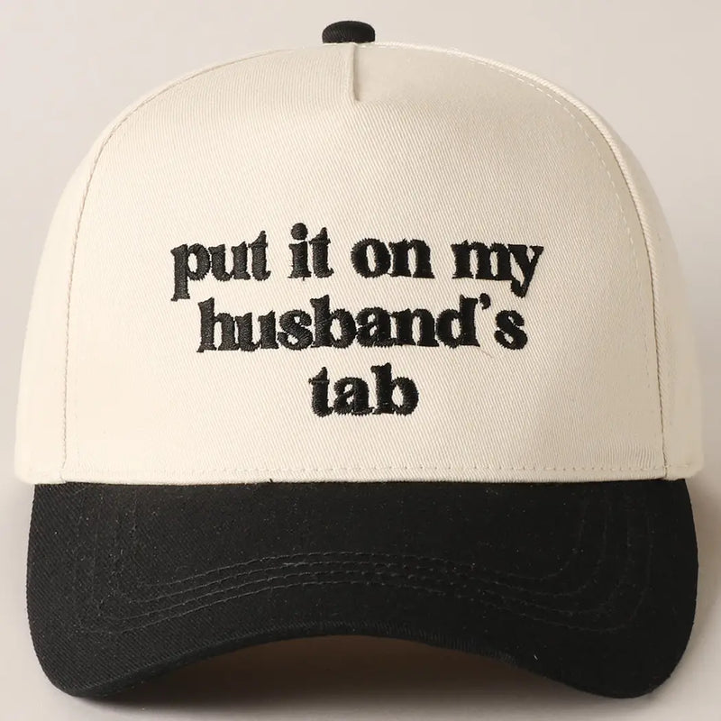 Husbands Tab Trucker Hat in Black