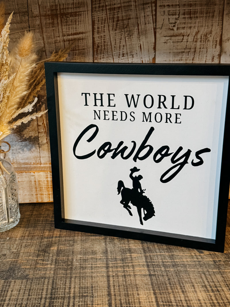 The World Needs More Cowboys Sign